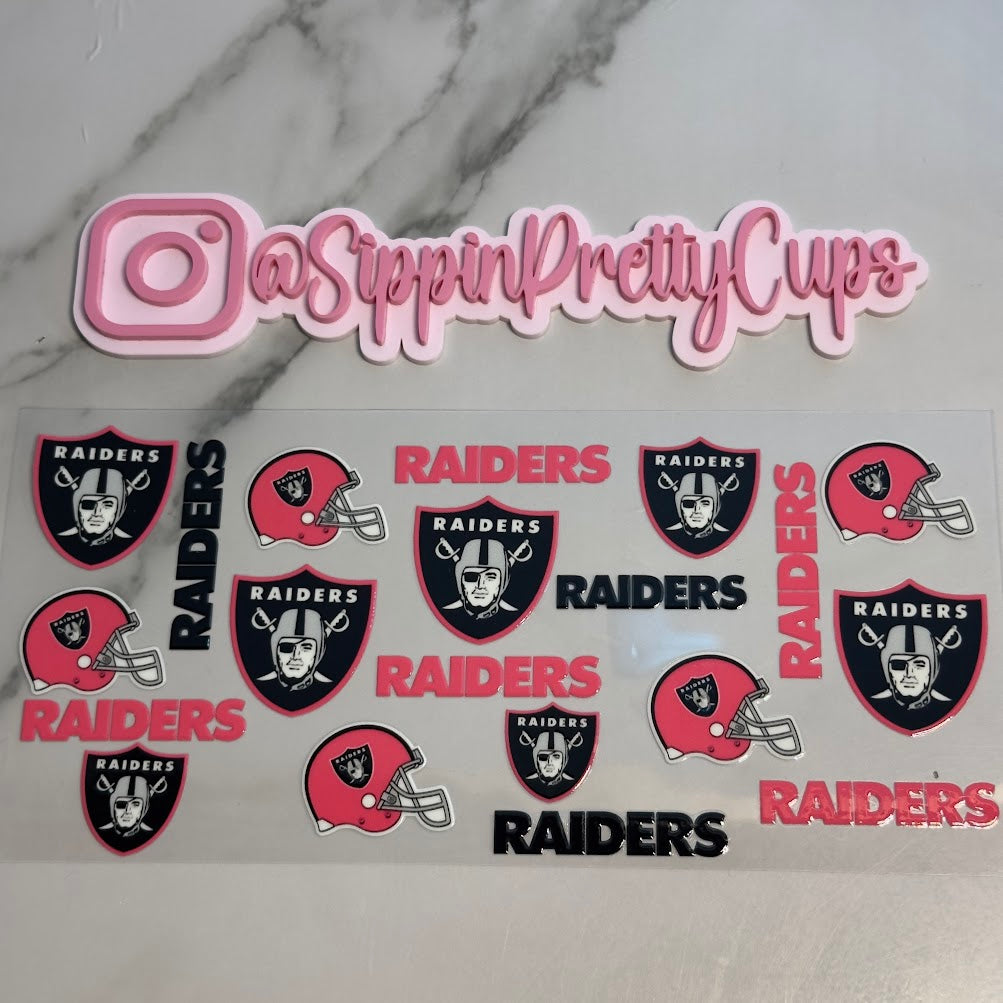Sports /  Hot Pink and Black Raiders Football Team